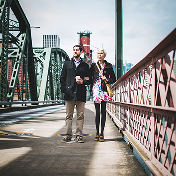 Couple Walking on Bridge